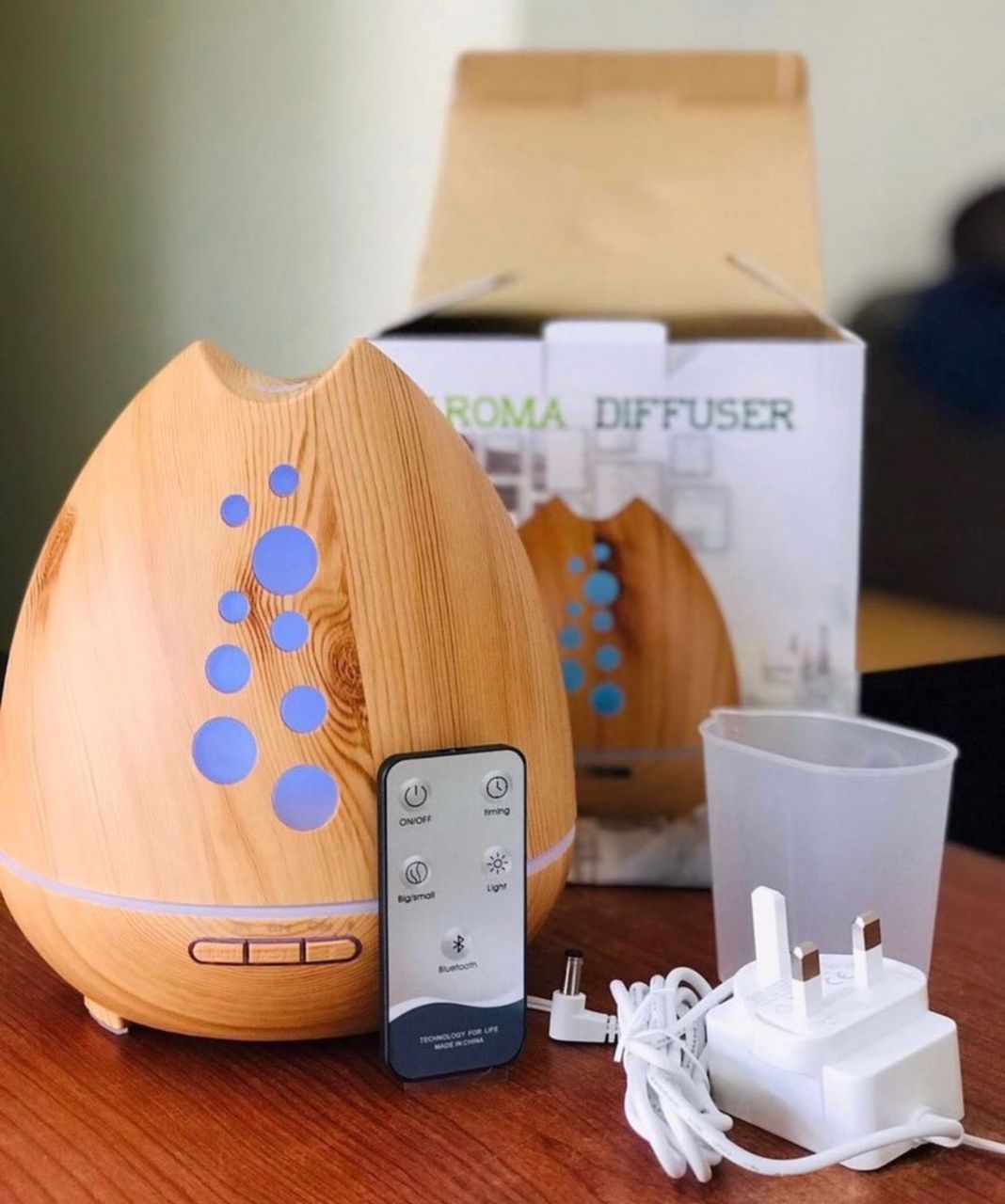 400ml aroma diffuser with remote control and Bluetooth speaker.